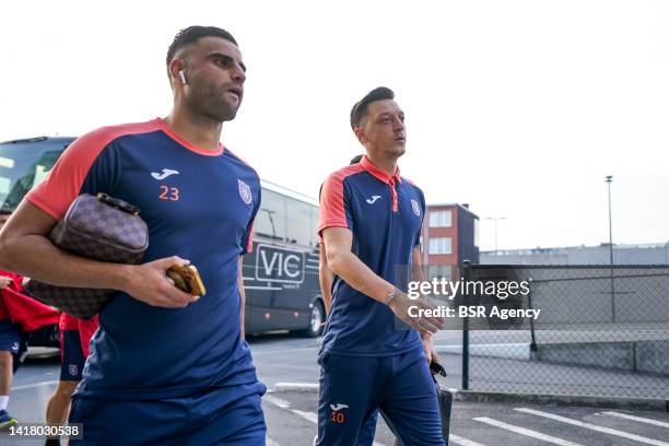 Deniz Turuc of Istanbul Basaksehir and Mesut Ozil of Istanbul Basaksehir arrive prior to the UEFA Conference League Play-Off Second Leg match between...