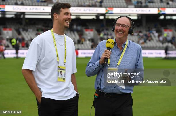 Steven Finn and Jonathan Agnew of BBC Test Match Special on the field before the second Test between England and South Africa at Old Trafford on...