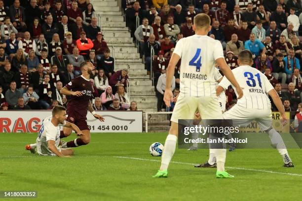 Karol Mets of FC Zurich is fouled by Jorge Grant of Heart of Midlothian leading to a second yellow card which led to a red card during the UEFA...