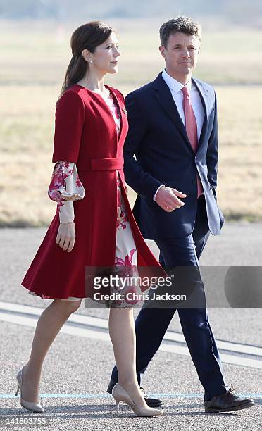 Crown Princess Mary of Denmark and Crown Prince Frederik Of Denmark wait to greet Prince Charles, Prince of Wales at Copenhagen Kastrup Airport on...