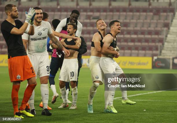 Zurich players celebrate their side's victory after the UEFA Europa League Play Off Second Leg match between Heart of Midlothian and FC Zurich at...