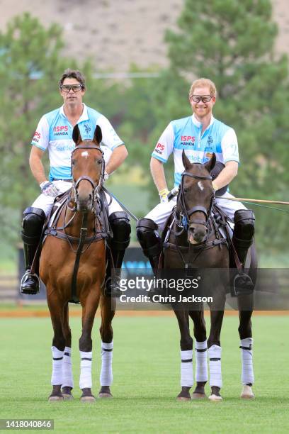 Sentebale Ambassador Nacho Figueras and Prince Harry, Duke of Sussex play polo during the Sentebale ISPS Handa Polo Cup 2022 on August 25, 2022 in...