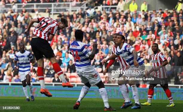 Nicklas Bendtner of Sunderland scores a goal from a header during the Barclays Premier League match between Sunderland and Queens Park Rangers at...