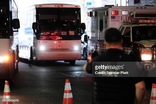 Bus carrying migrants who crossed the border from Mexico into Texas arrives into the Port Authority bus station in Manhattan on August 25, 2022 in...
