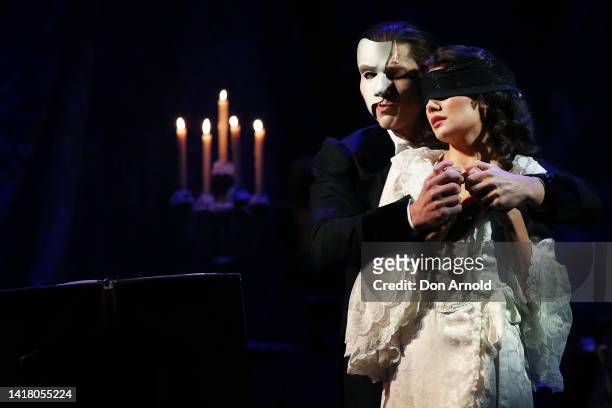 Josh Pitterman plays the role of the Phantom and Amy Manford the role of Christine Daae during a media call for Phantom of the Opera at Sydney Opera...