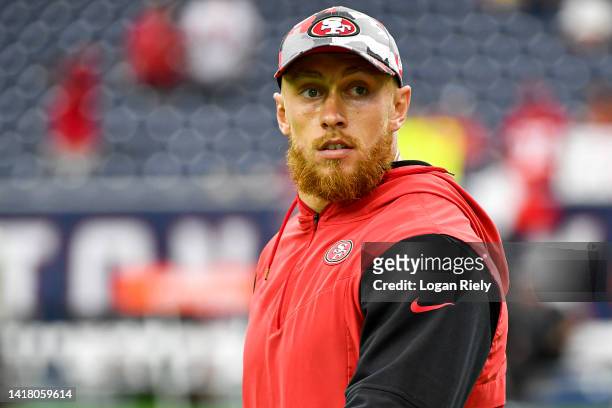 George Kittle of the San Francisco 49ers acknowledges fans prior to the preseason game at NRG Stadium against the Houston Texans on August 25, 2022...