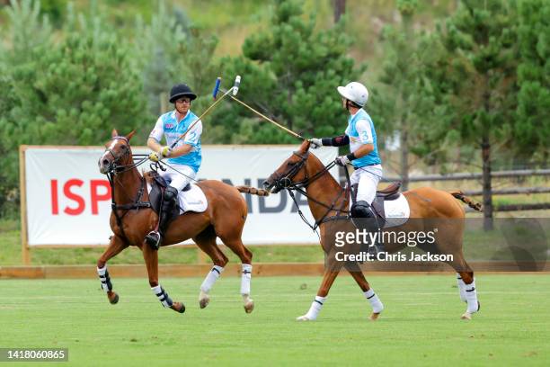 Prince Harry, Duke of Sussex and Sentebale Ambassador Nacho Figueras play polo during the Sentebale ISPS Handa Polo Cup 2022 on August 25, 2022 in...