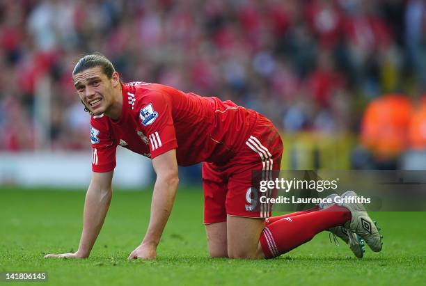 Andy Carroll of Liverpool shows his dispair during the Barclays Premier League match between Liverpool and Wigan Athletic at Anfield on March 24,...