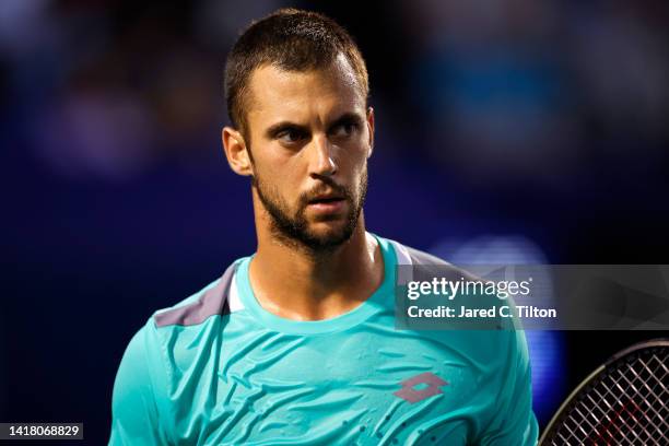 Laslo Djere of Serbia looks on during the quarterfinals match against Richard Gasquet of France on day six of the Winston-Salem Open at Wake Forest...
