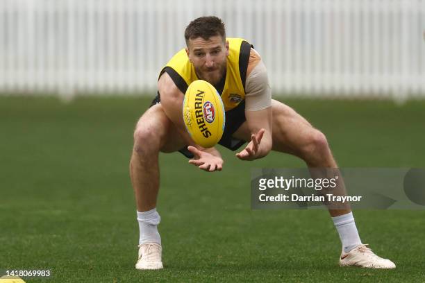 Marcus Bontempelli marks the ball during a Western Bulldogs AFL training session at ETU Stadium on August 26, 2022 in Melbourne, Australia.