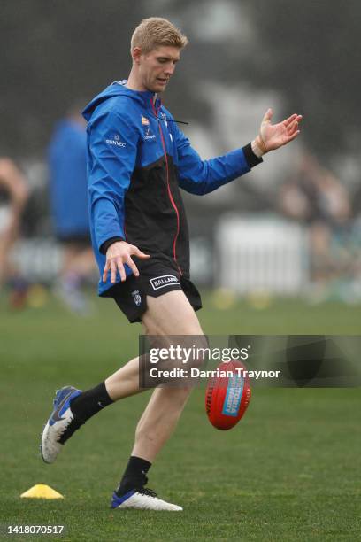 Tim English kicks the ball during a Western Bulldogs AFL training session at ETU Stadium on August 26, 2022 in Melbourne, Australia.