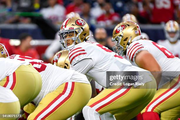 Trey Lance of the San Francisco 49ers sits behind the center in the first quarter during a preseason game against the Houston Texans at NRG Stadium...