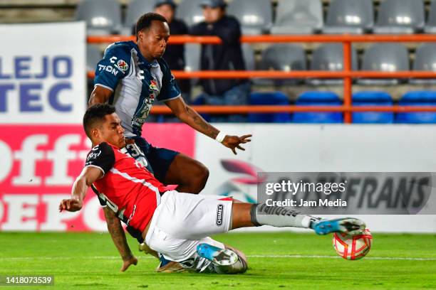 Anderson Santamaria of Atlas fights for the ball with Romario Ibarra of Pachuca during the 16th round match between Pachuca and Atlas as part of the...