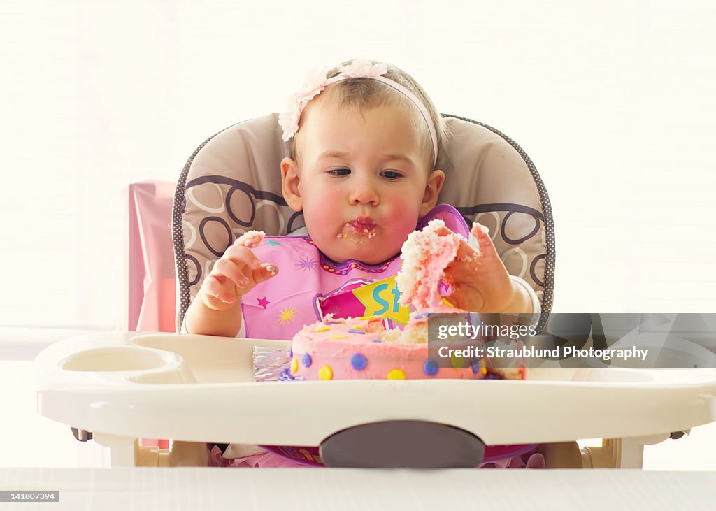 Baby eating cake