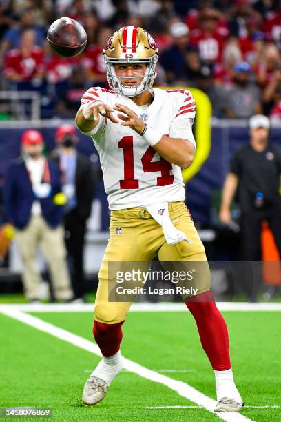 Brock Purdy of the San Francisco 49ers passes the ball in the second quarter during a preseason game against the Houston Texans at NRG Stadium on...
