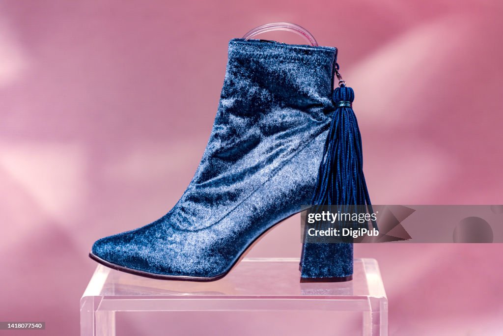 Blue velvet ankle boots with tessels