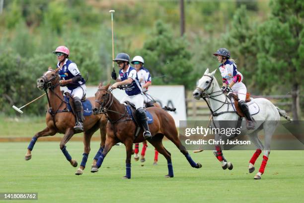 Juan Bollini, David Farache and Ashley Van Metre play polo at the Sentebale ISPS Handa Polo Cup 2022 on August 25, 2022 in Aspen, Colorado.