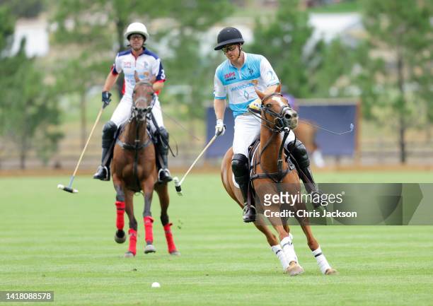 Gonzalo Pieres Jnr and Prince Harry, Duke of Sussex play polo during the Sentebale ISPS Handa Polo Cup 2022 on August 25, 2022 in Aspen, Colorado.