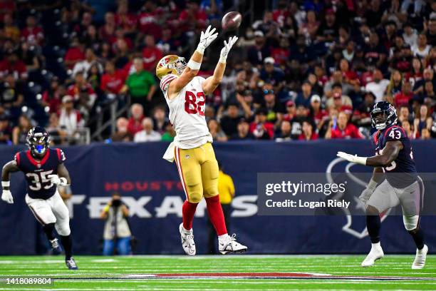 Ross Dwelley of the San Francisco 49ers catches a ball in the third quarter during a preseason game against the Houston Texans at NRG Stadium on...