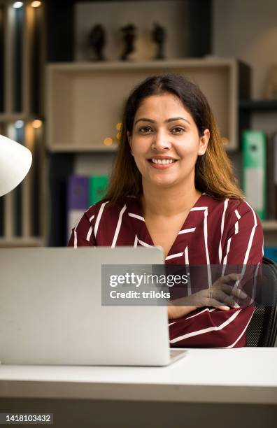 happy woman using laptop at home - india woman computer stock pictures, royalty-free photos & images