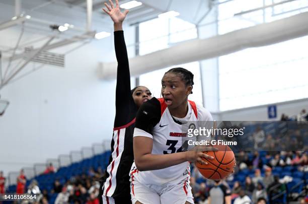 Tenin Magassa of the Dayton Flyers handles the ball against the UMass Minutewomen during the Championship game of the 2022 Women's Atlantic 10...