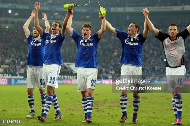 Christian Fuchs, Joel Matip, Klaas-Jan Huntelaar, Kyriakos Papadopoulos and Marco Hoeger of Schalke celebrate the 2-0 victory after the Bundesliga...