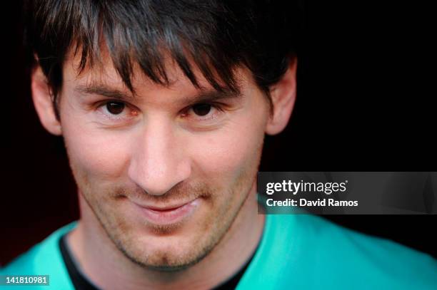 Lionel Messi of FC Barcelona looks on prior to the La Liga match between RCD Mallorca and FC Barcelona at Iberostar Stadium on March 24, 2012 in...