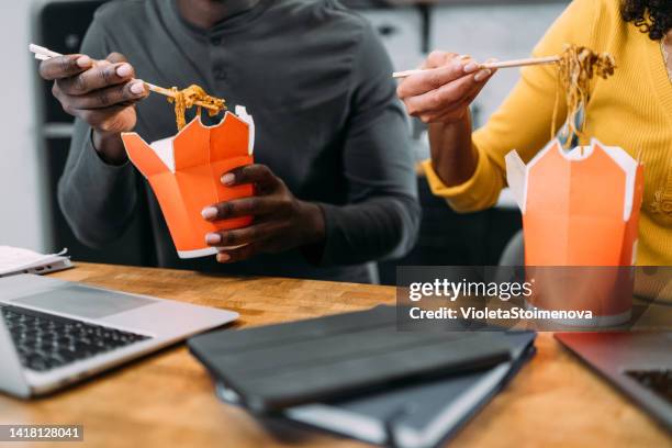 couple working from home. - chinese takeout stock pictures, royalty-free photos & images