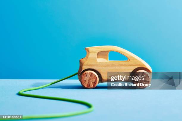 a wooden electric car - toy car foto e immagini stock