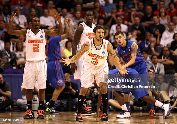 Peyton Siva of the Louisville Cardinals reacts after being called for a foul in the second half while taking on the Florida Gators during the 2012...