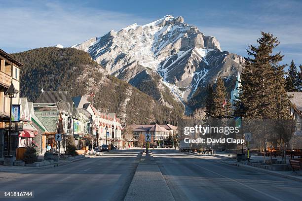 early morning in the town of banff, banff national park, the canadian rockies, alberta, canada, north america. - banff national park fotografías e imágenes de stock