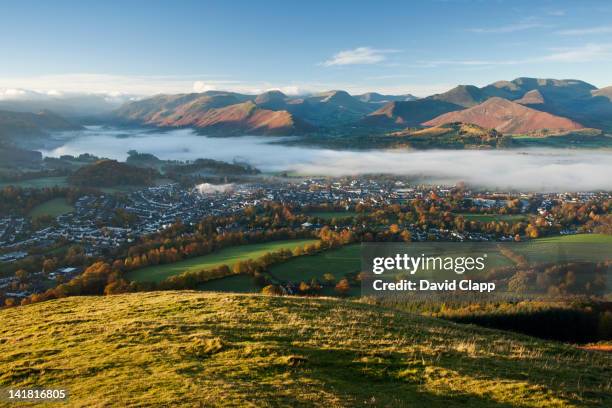 a misty morning across derwent water from latrigg, keswick in the lake district, cumbria, england, uk - keswick stock pictures, royalty-free photos & images