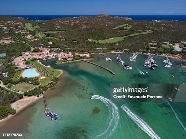 An aerial image of the Pevero Golf Club in front of the bay of Cala di Volpe and the eponymous 5-star hotel of the Marriot chain on August 26, 2022...