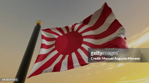 rising sun flag of the japanese imperial navy (world war ii) - japanische flagge stock-fotos und bilder