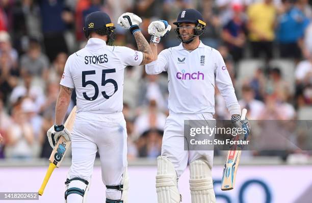 England batsman Ben Foakes reaches his 50 and is congratulated by Ben Stokes during day two of the second test match between England and South Africa...