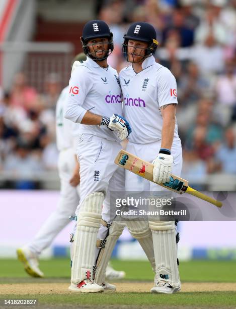 Ben Foakes of England is congratulated by captain Ben Stokes after reaching his 50 during day two of the Second LV= Insurance Test Match between...