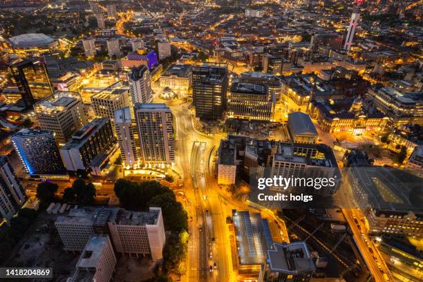 birmingham united kingdom aerial view over the city center by night - west midlands uk stock pictures, royalty-free photos & images