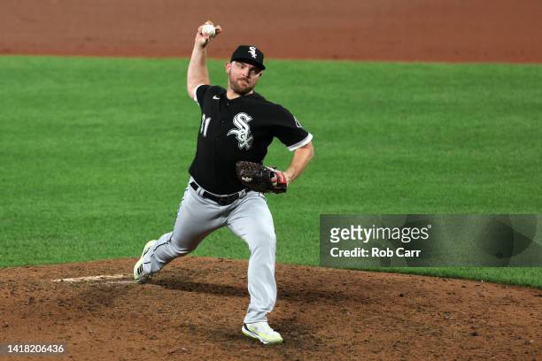 Liam Hendriks of the Chicago White Sox pitches to a Baltimore Orioles batter at Oriole Park at Camden Yards on August 25, 2022 in Baltimore, Maryland.