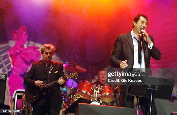 Roxy Music, Bryan Ferry, Paul Thompson, Chris Spedding, dancers with feathers, Suikerrock Festival, Tienen, Belgium, 29th July 2005.