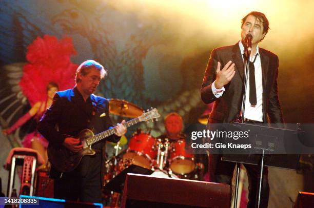 Roxy Music, Bryan Ferry, Paul Thompson, Chris Spedding, dancers with feathers, Suikerrock Festival, Tienen, Belgium, 29th July 2005.