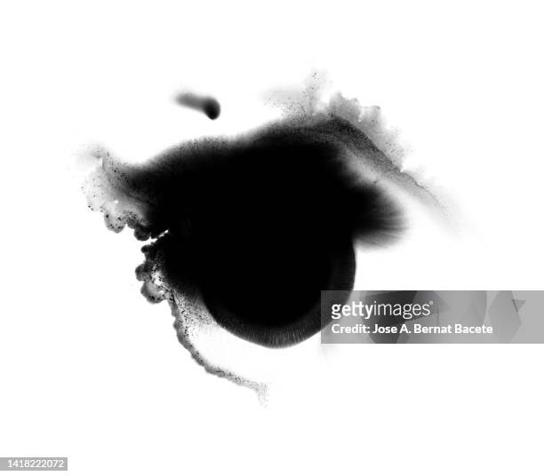 drop of black paint sliding on a white background. - oozes stock pictures, royalty-free photos & images