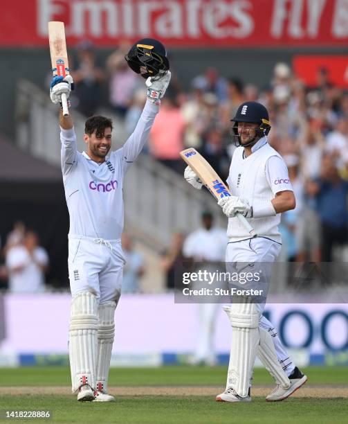 England batsman Ben Foakes reaches his century as Ollie Robinson applauds during day two of the second test match between England and South Africa at...