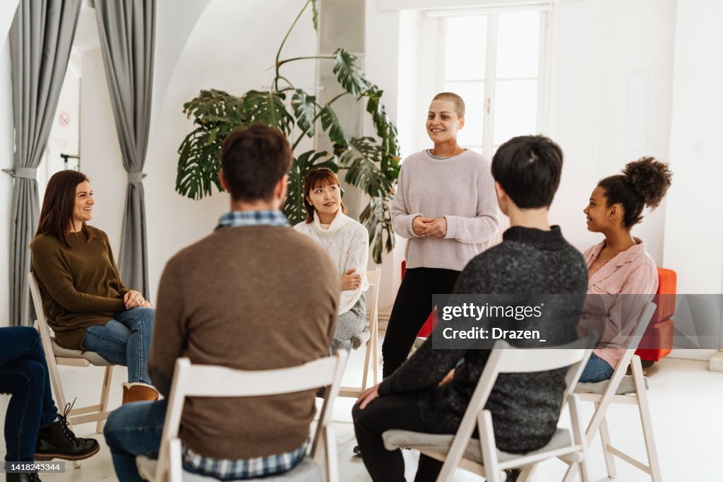 Woman talking about depression and anxiety in the group session