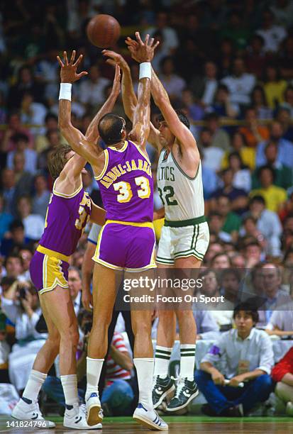 Kareem Abdul-Jabbar of the Los Angeles Lakers guards Kevin McHale of the Boston Celtics during the 1985 NBA Basketball Finals at the Boston Garden in...