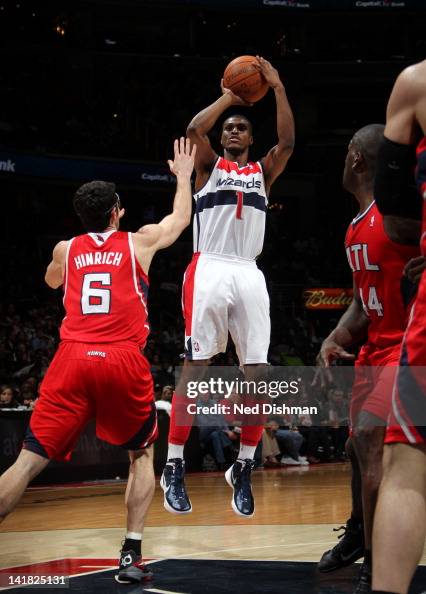 Edwin Ubiles Edwin Ubiles of the Washington Wizards shoots against Kirk Hinrich of ...
