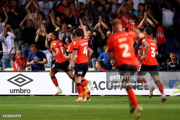 Carlton Morris of Luton Town celebrates after scoring their team's first goal during the Sky Bet Championship between Luton Town and Sheffield United...