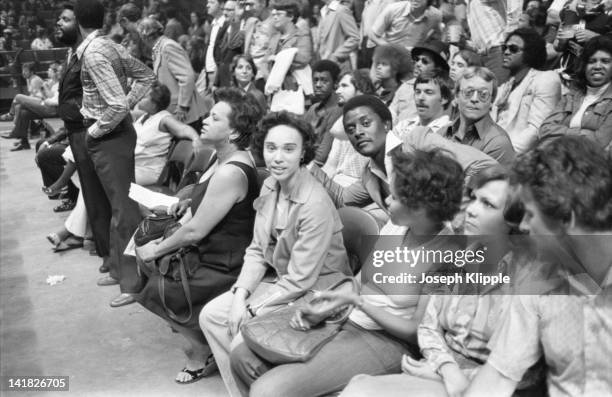 View of boxing fans in the stands at a Heavyweight Championship bout between American boxer Muhammad Ali and Uruguayan Alfredo Evangelista at the...