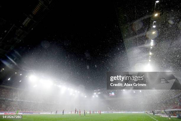 General view of play inside the stadium as rain falls during the Bundesliga match between Sport-Club Freiburg and VfL Bochum 1848 at Europa-Park...