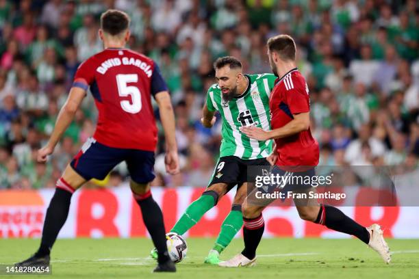 Borja Iglesias of Real Betis scores their team's first goal during the LaLiga Santander match between Real Betis and CA Osasuna at Estadio Benito...