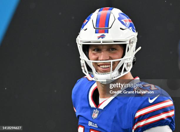 Josh Allen of the Buffalo Bills smiles during warmups before a preseason game against the Carolina Panthers at Bank of America Stadium on August 26,...